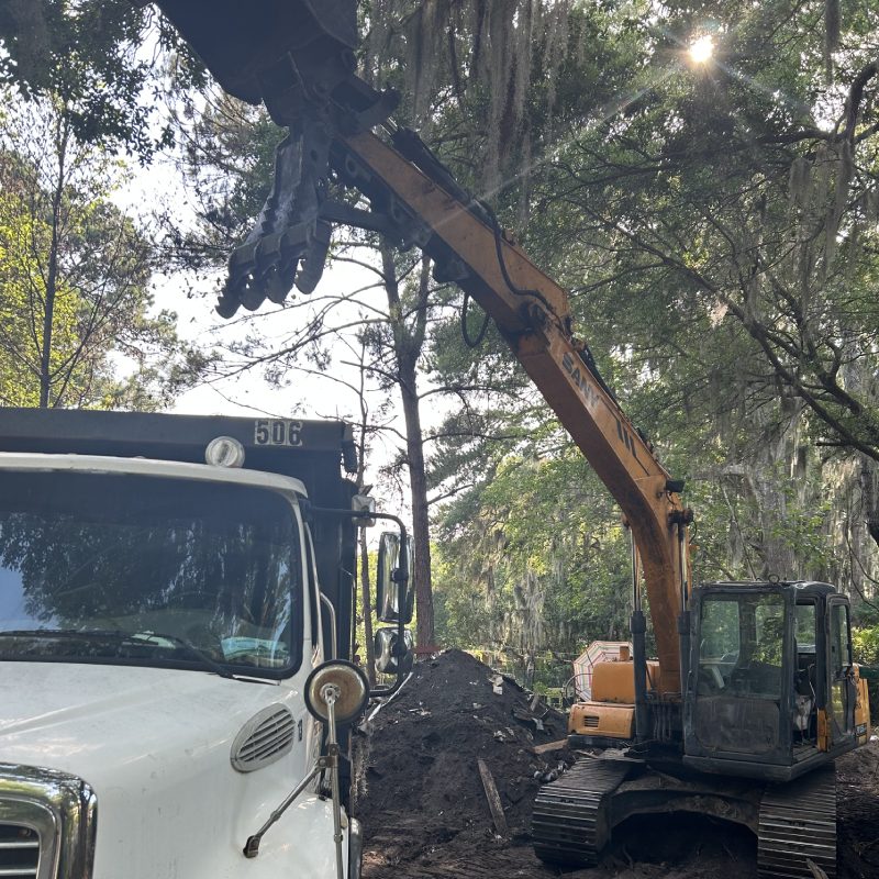 Excavation Services new man in protective helmet turning head towards camera